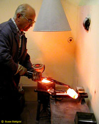 Melting and casting the molten alloy into ingots   -   Click to view a larger resolution image