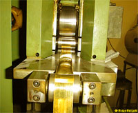 Rolling the ingots down to a ribbon thinness of 0.015 mm   -   Click to view a larger resolution image